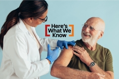 doctor administering vaccine to older man