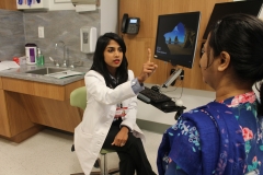 Dr. Rupa Juthani examines a patient