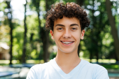 A young boy smiling