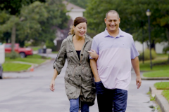 Sandy Krykostas walking with his wife.