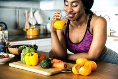 woman after workout in the kitchen