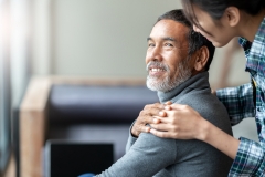 older man with daughter by his side