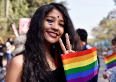 supporter of the lesbian, gay, bisexual, transgender (LGBT) community take part in a pride parade
