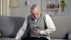 Old male having strong abdominal ache, stomach ulcer disease, health problems