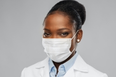 black women doctor with mask on