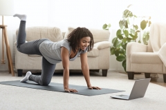 woman works out at home