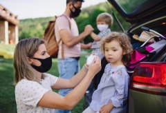 family wears masks