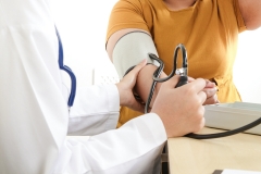 patient getting their blood pressure checked