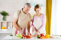 older couple preparing healthy meal