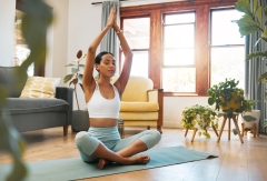 Yoga, woman and hands above head for meditation