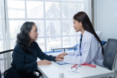 During a consultation in the office, female patients received advice on options and engaged in discussions about their overall health and treatment plans. This interaction between medical professional