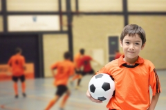 kid playing soccer