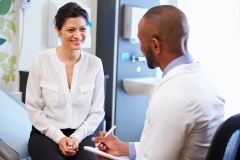 woman consults with doctor