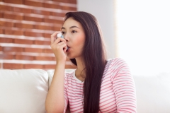 woman with inhaler