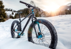 Fat-bike on the snowy mountain trail