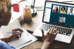 women working from home on video call.