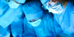 surgeons performing an operation