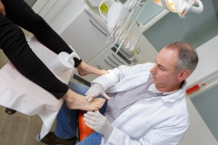 podiatrist working in a clinic