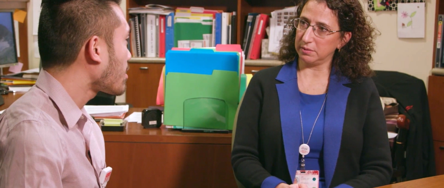 Photo of Dr. Lia Logio with a patient